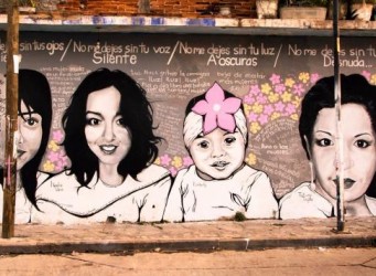 Imagen de un grafitti sobre feminicidio con varias caras femeninas